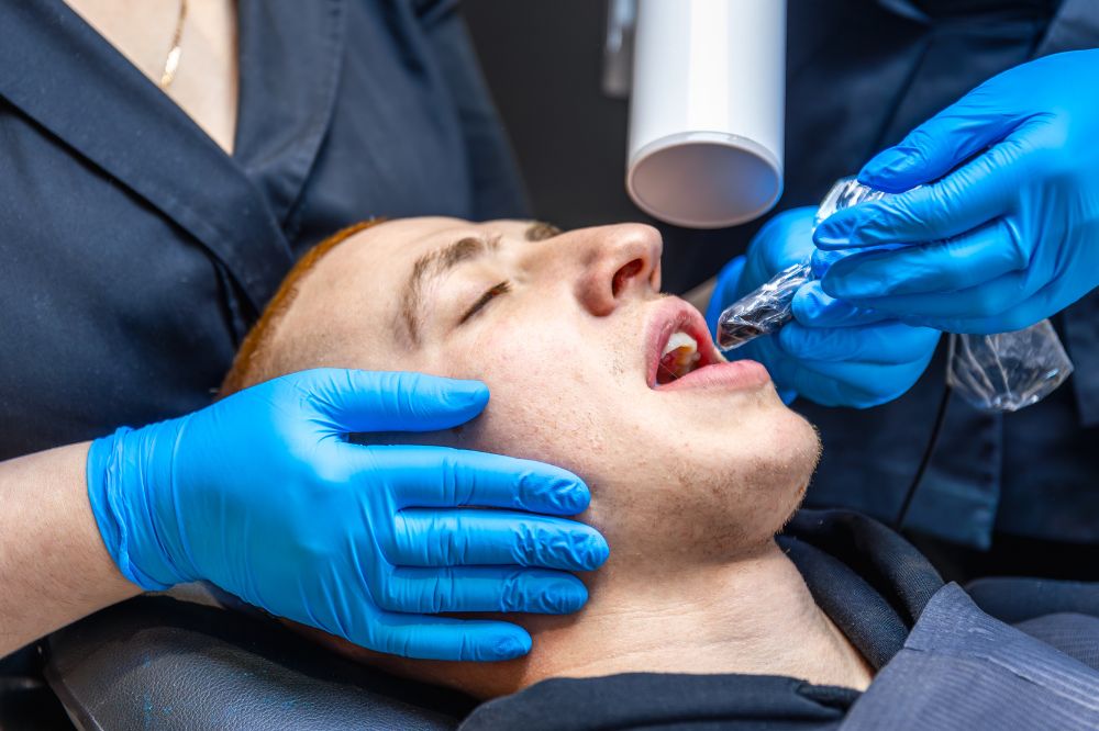 a man is getting root canal treatment